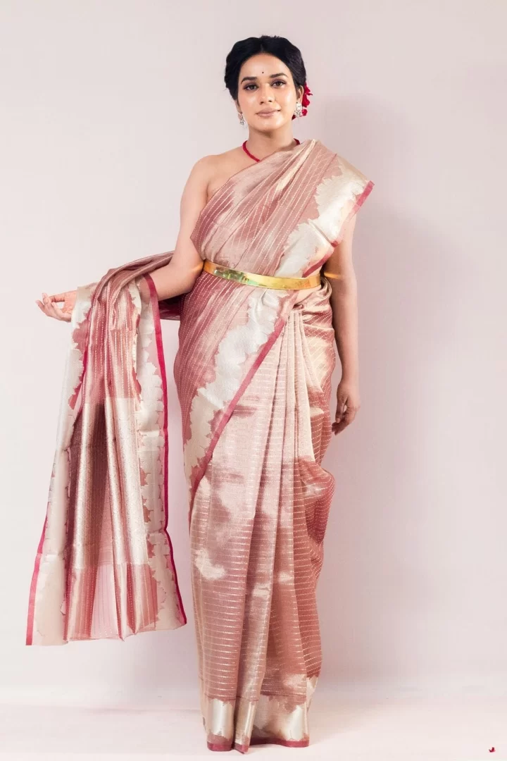 Opulent Wine Tissue strip Weave Saree