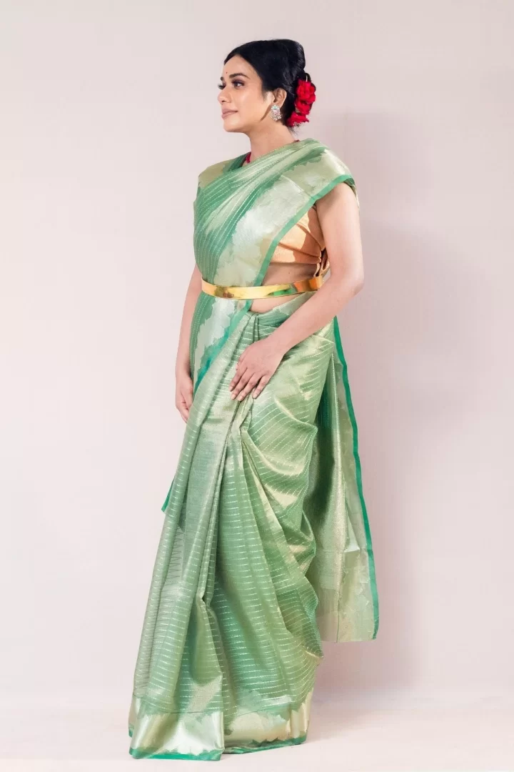 Vibrant Green Tissue Strip Weave Saree