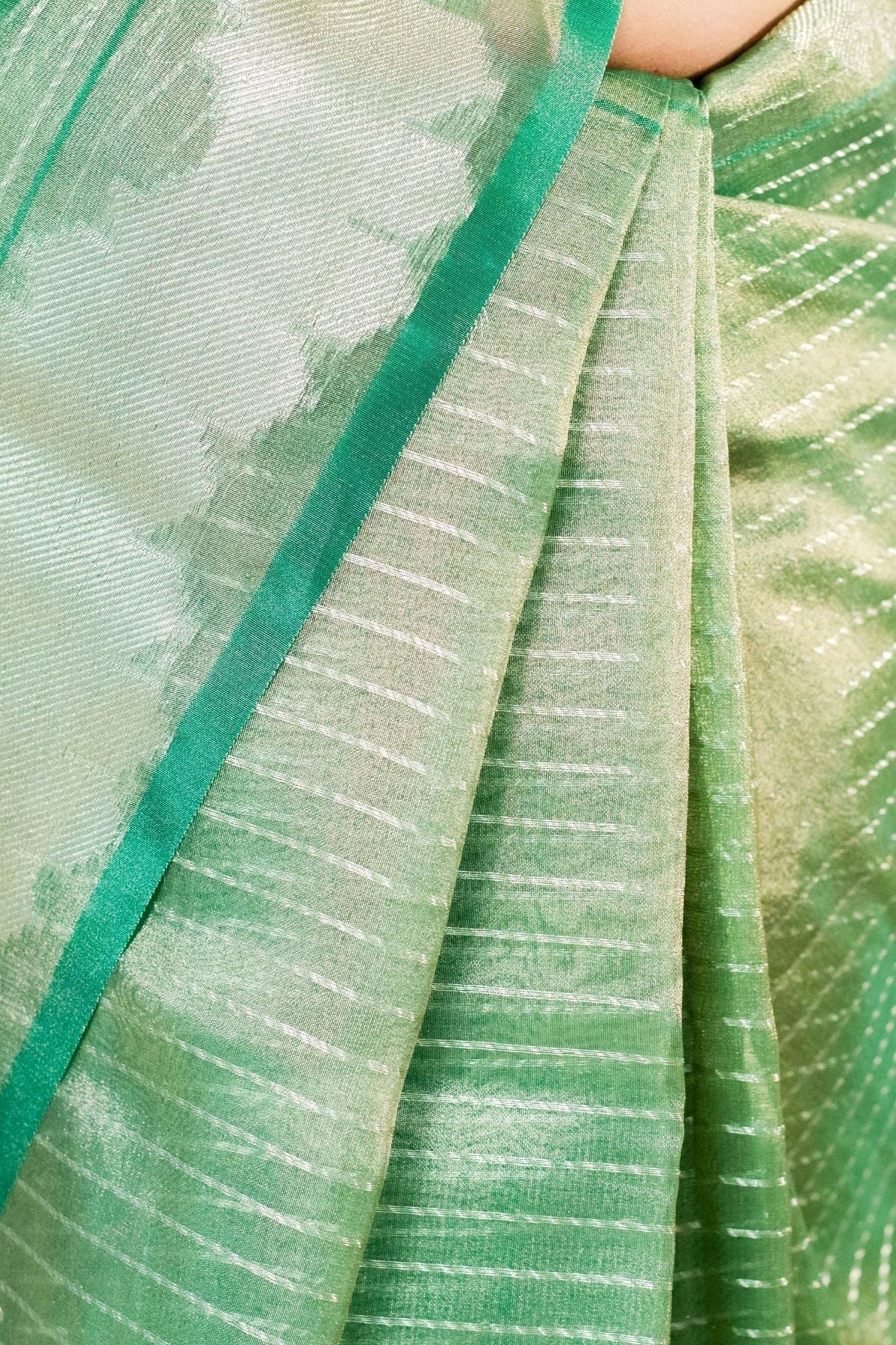 Green Tissue Strip Weave Saree